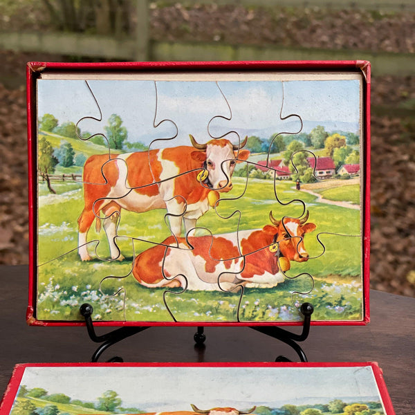 Vintage jigsaw puzzel met twee koeien - Bamestra Curiosa